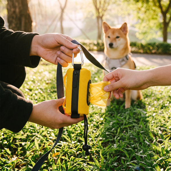 ClipTidy Waterproof Poop Bag Dispenser Yellow in use